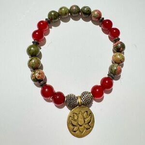 Elegant Red and Green Beaded Bracelet with Gold Charm